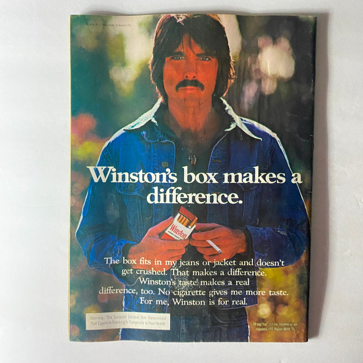 Back cover of VTG Crawdaddy Magazine February 1976 featuring a Winston cigarette advertisement, showcasing a man in a denim jacket with a box of Winston cigarettes.