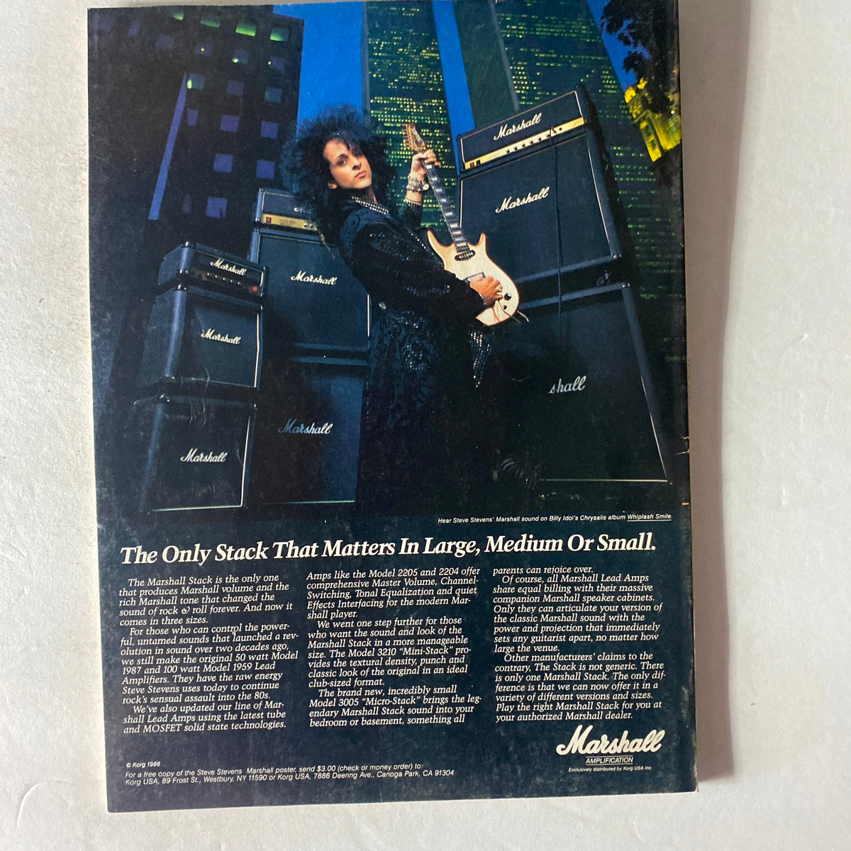 Back cover of Guitar World Magazine June 1987 featuring an advertisement for Marshall amplifiers, showcasing a guitarist with curly hair in front of stacks of amplifiers, emphasizing the tagline 'The Only Stack That Matters In Large, Medium Or Small.'
