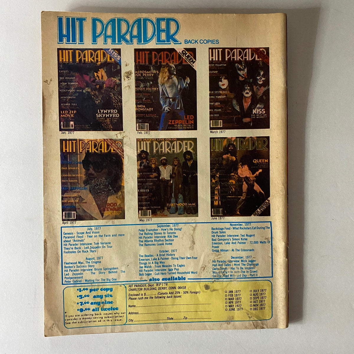 Back cover of Hit Parader Magazine May 1978 featuring a collage of past magazine covers, prominently displaying Kiss, with a list of available back issues and subscription information. VTG Hit Parader Magazine May 1978 Kiss To The Rescue w Poster.