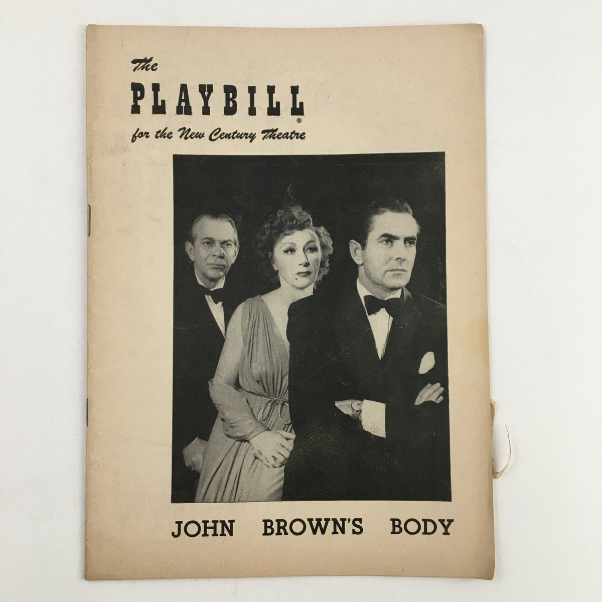 1953 Playbill for John Brown's Body featuring a striking black and white cover design, showcasing three actors in formal attire, presented at the New Century Theatre.