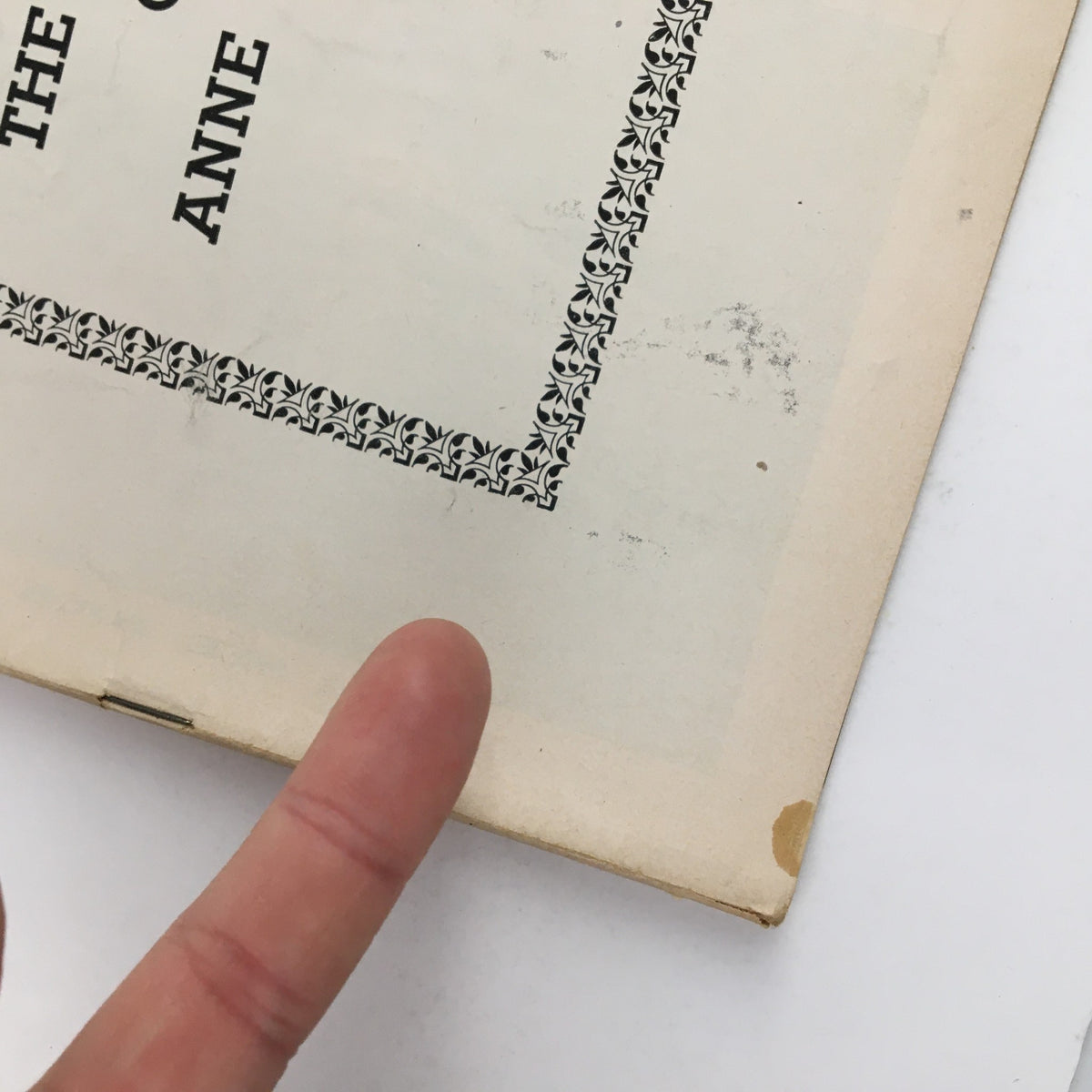 Close-up of the corner of the 1955 Playbill for The Diary of Anne Frank, highlighting minor wear.