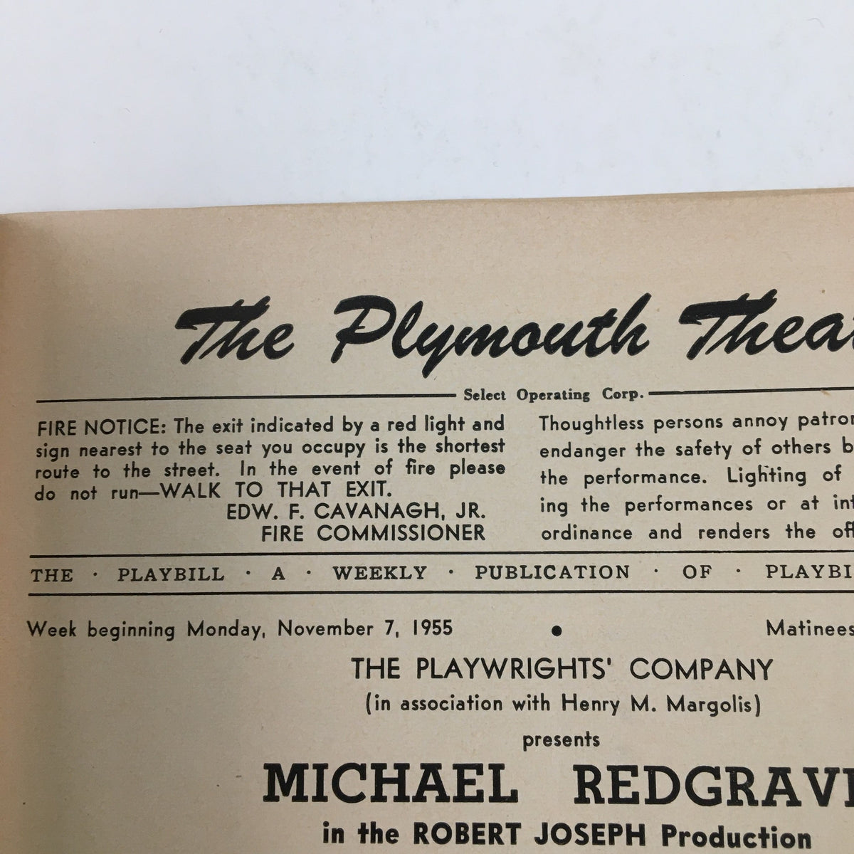 The Plymouth Theatre Playbill for 'Tiger At The Gates' by Harold Clurman from November 7, 1955, featuring fire safety notice and event details.