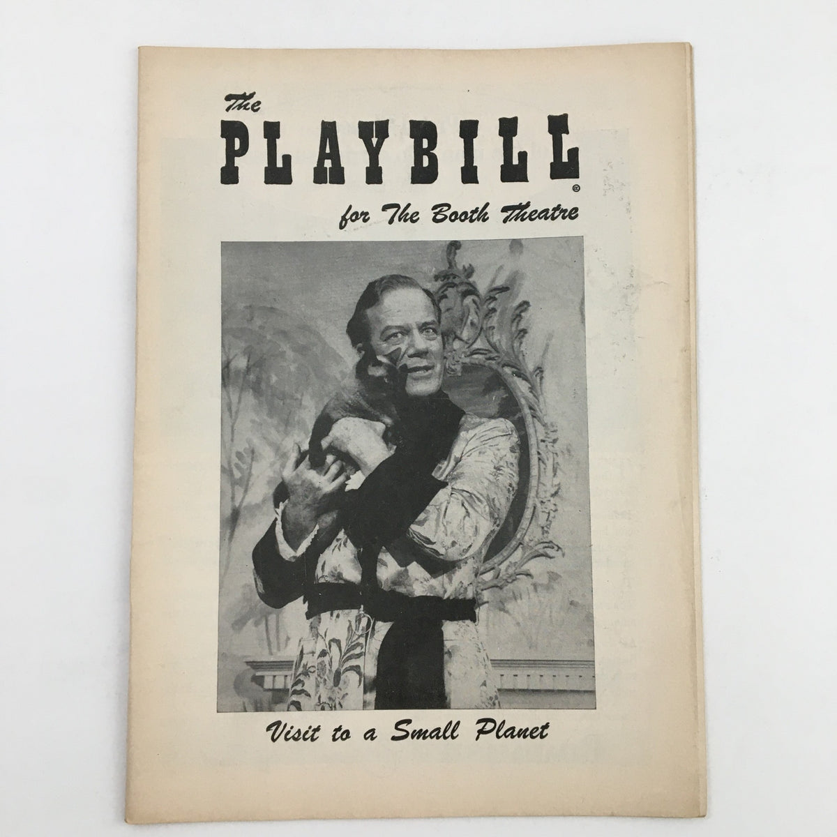 Vintage 1957 Playbill for The Booth Theatre featuring Cyril Ritchard in Visit To A Small Planet, showcasing classic theatre memorabilia.