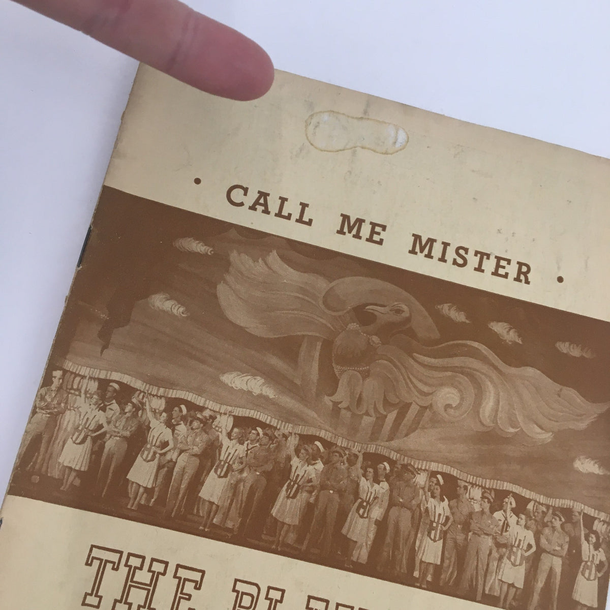 Close-up of the 1946 Playbill for Call Me Mister, featuring artistic elements and title prominently displayed.