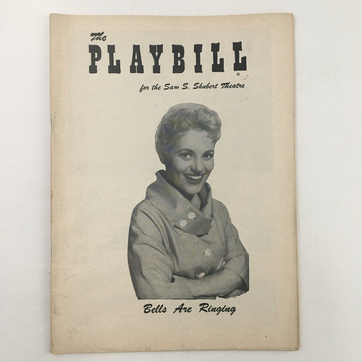 Cover of the 1957 Playbill for Sam S. Shubert Theatre featuring Judy Holliday in Bells Are Ringing.
