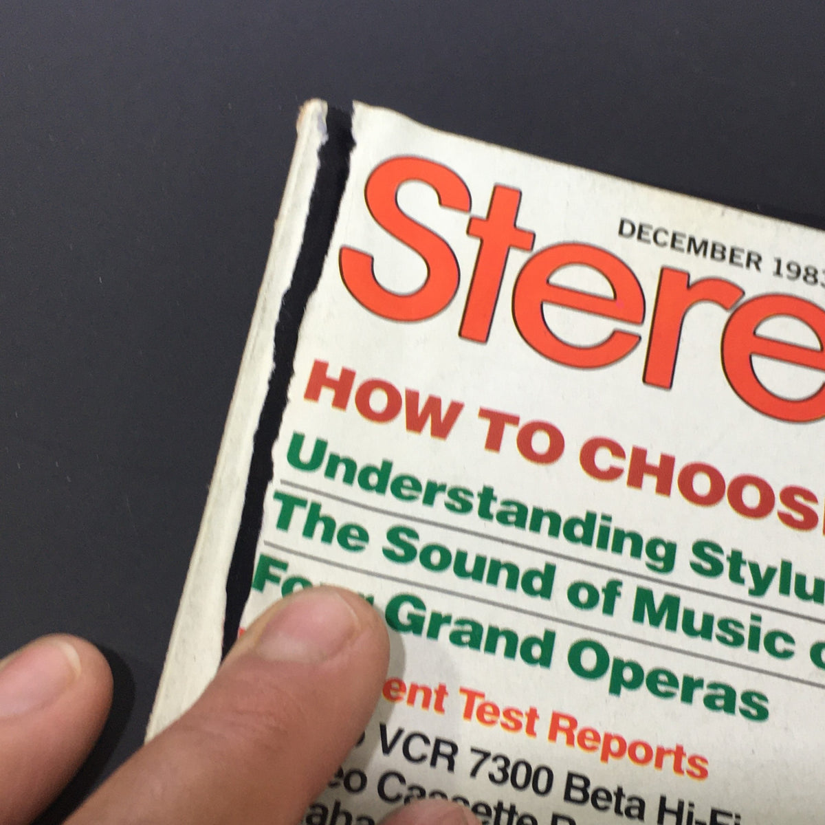 Close-up of the 'Stereo Review' magazine cover from December 1983, highlighting the article titles including 'How to Choose a Cartridge' and 'The Sound of Music on Video'.