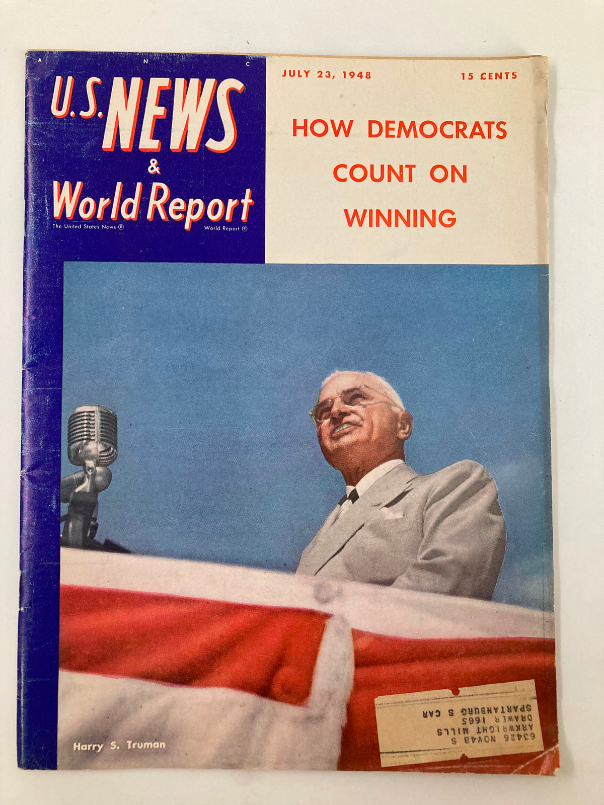 Cover of US News & World Report Magazine from July 23, 1948, featuring an image of Harry S. Truman speaking at a podium with an American flag.