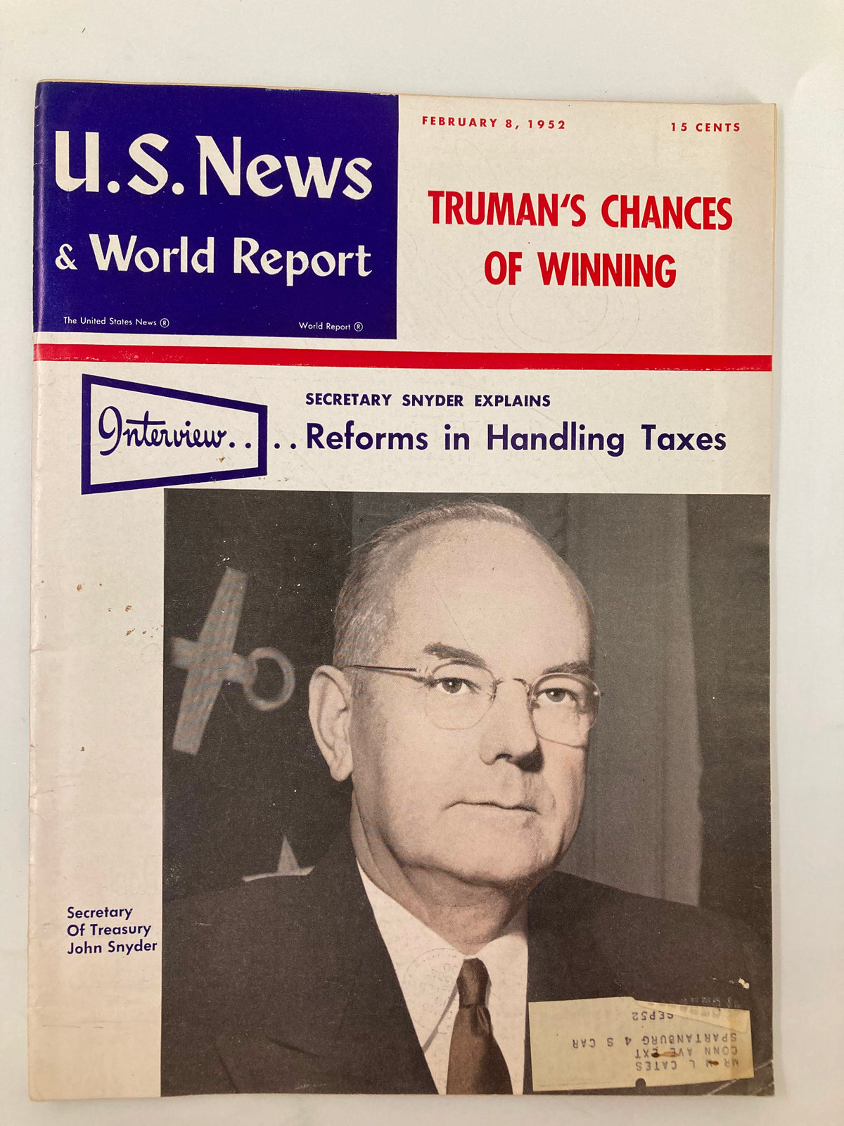 Cover of US News & World Report Magazine dated February 8, 1952, featuring an interview with Secretary of Treasury John Snyder discussing tax reforms, along with the title 'Truman's Chances of Winning'.