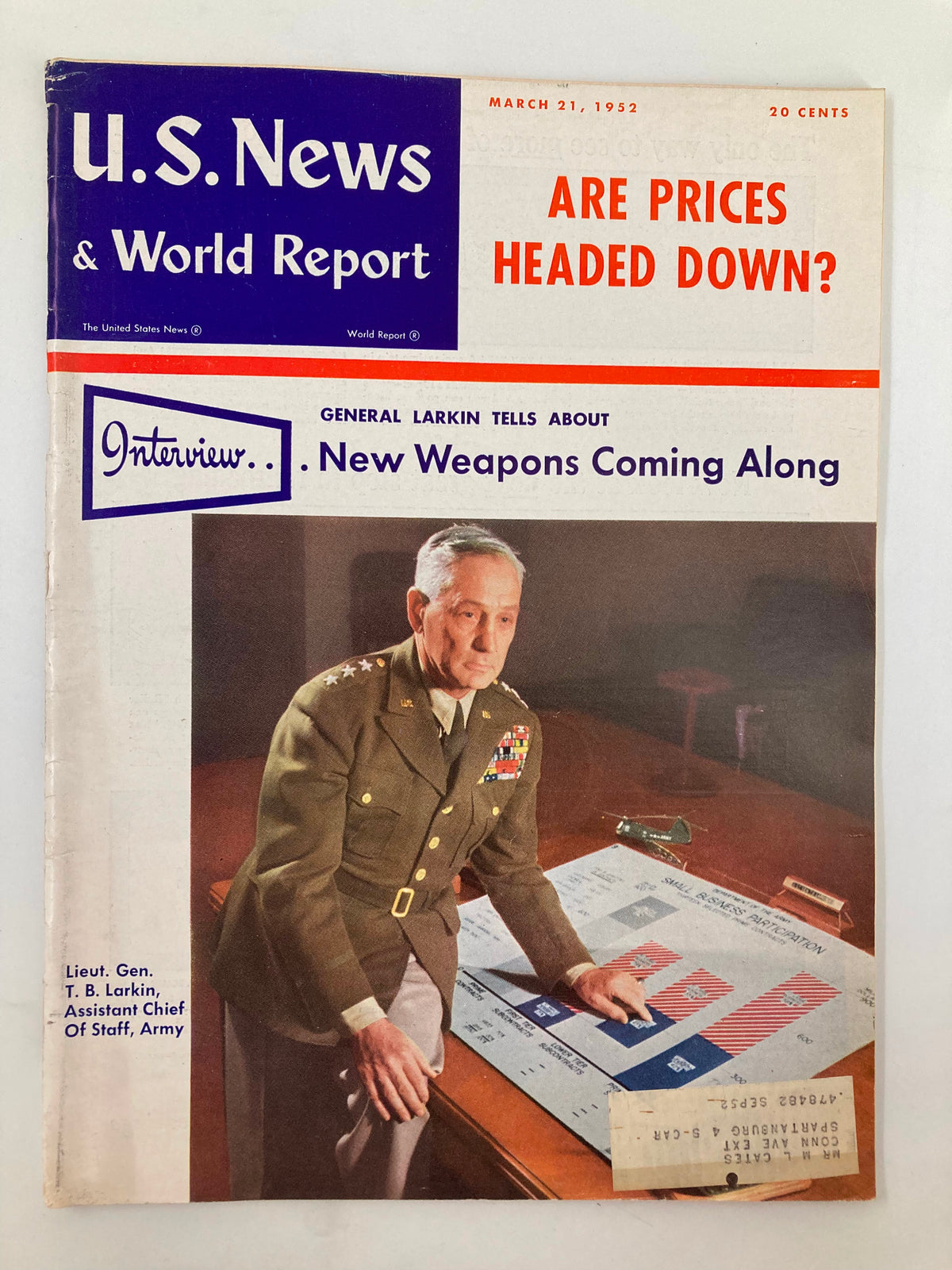 US News & World Report Magazine March 21, 1952, featuring an interview with Lieut. Gen. Thomas B. Larkin, showcasing military insights and a portrait of Larkin at a desk with maps.