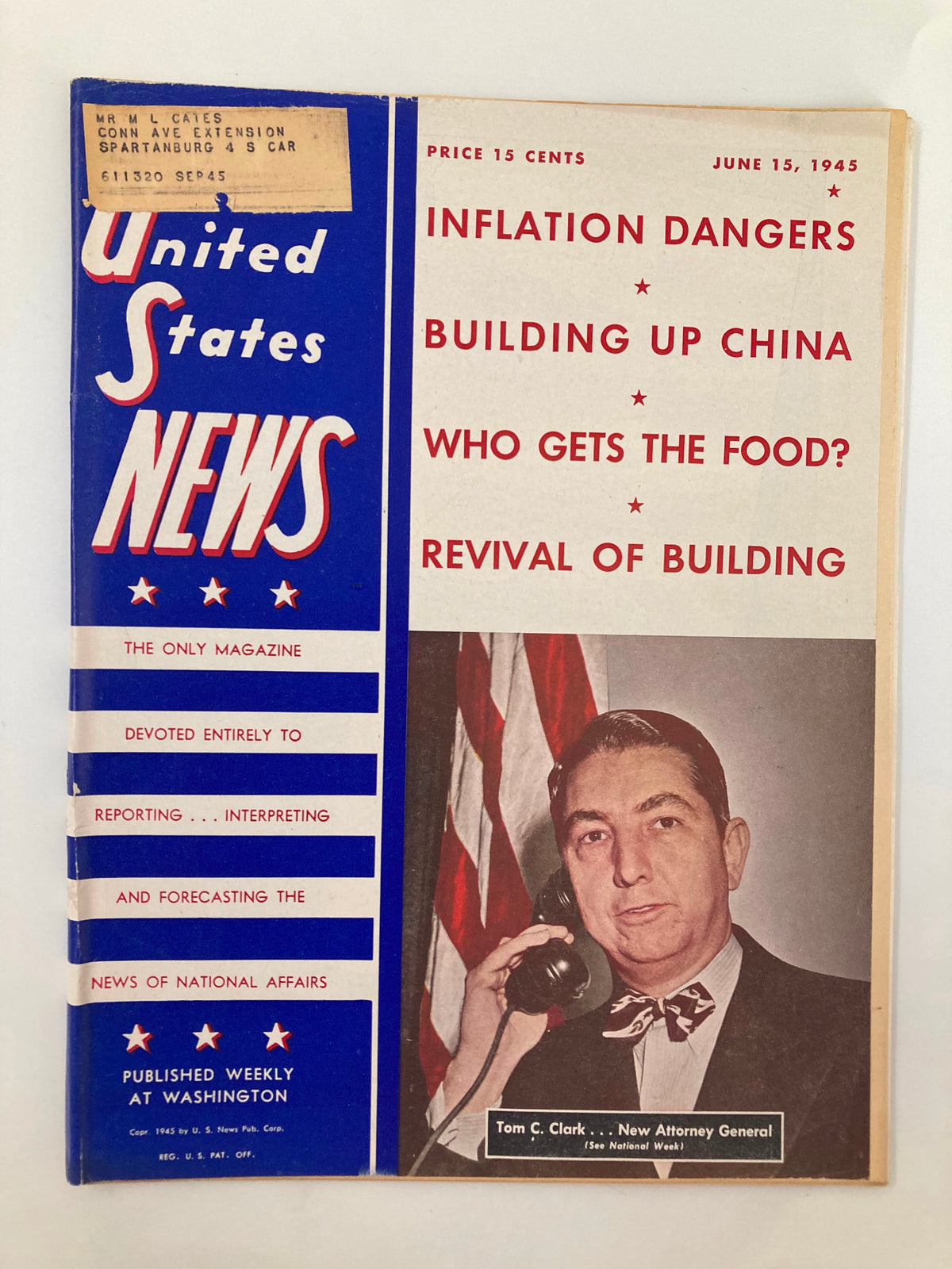 Cover of US News & World Report Magazine from June 15, 1945, featuring Atty. General Tom C. Clark with a telephone, discussing important post-war issues like inflation and rebuilding.
