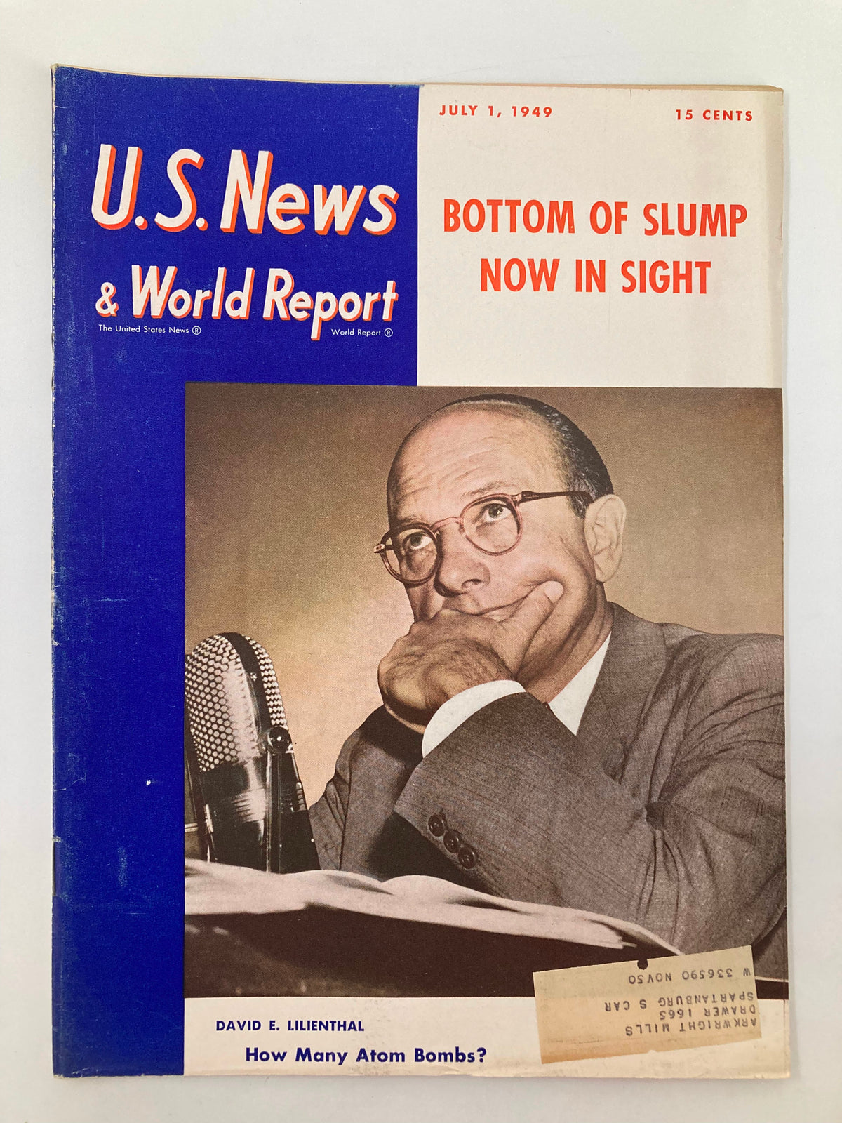 Cover of US News & World Report Magazine from July 1, 1949 featuring an article by David E. Lilienthal discussing atom bombs, showcasing a thoughtful man with a microphone.