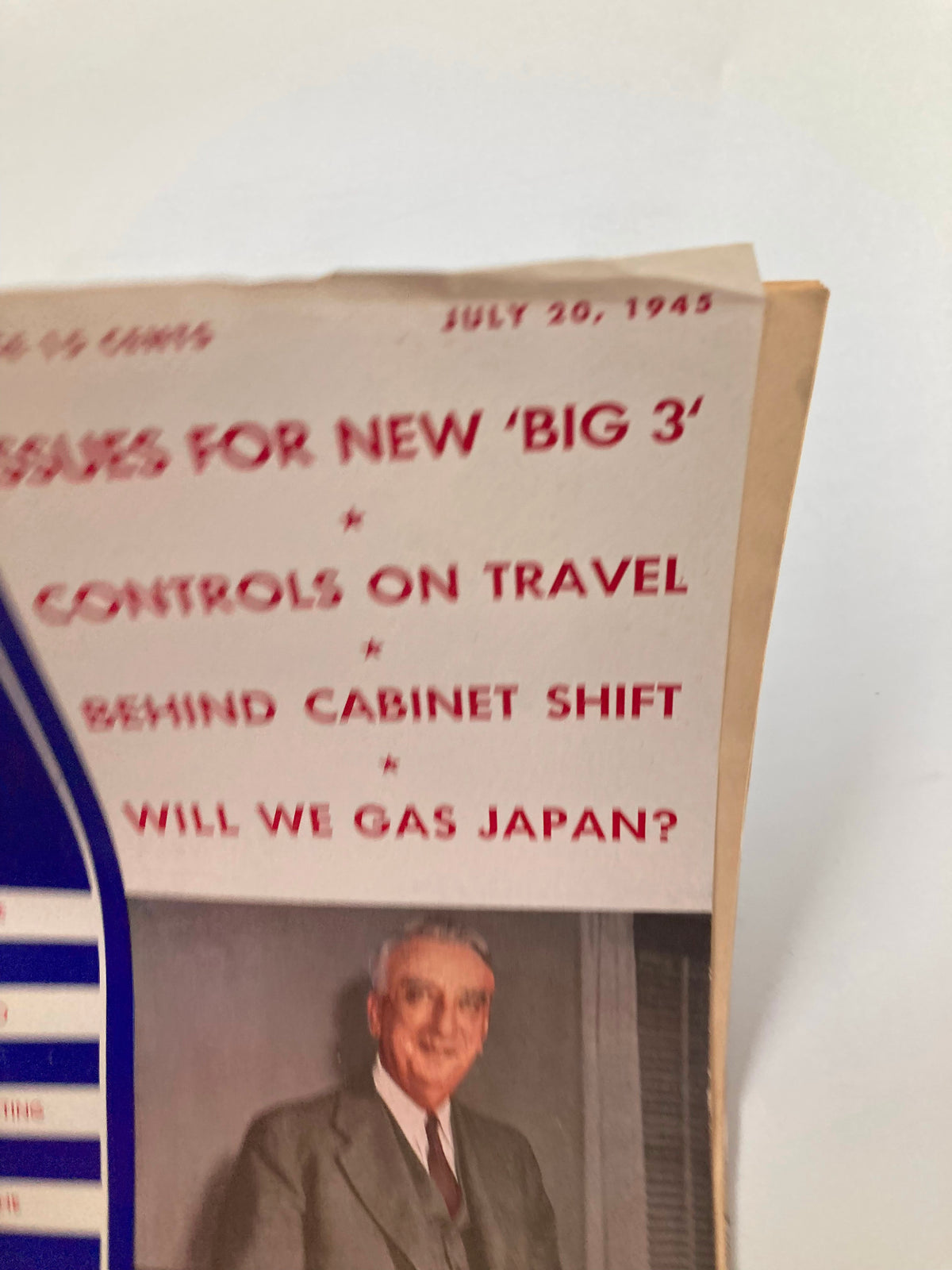 Close-up of the July 20, 1945 issue of US News & World Report Magazine, displaying headlines about significant political issues and the Secretary of Treasury Fred M. Vinson.