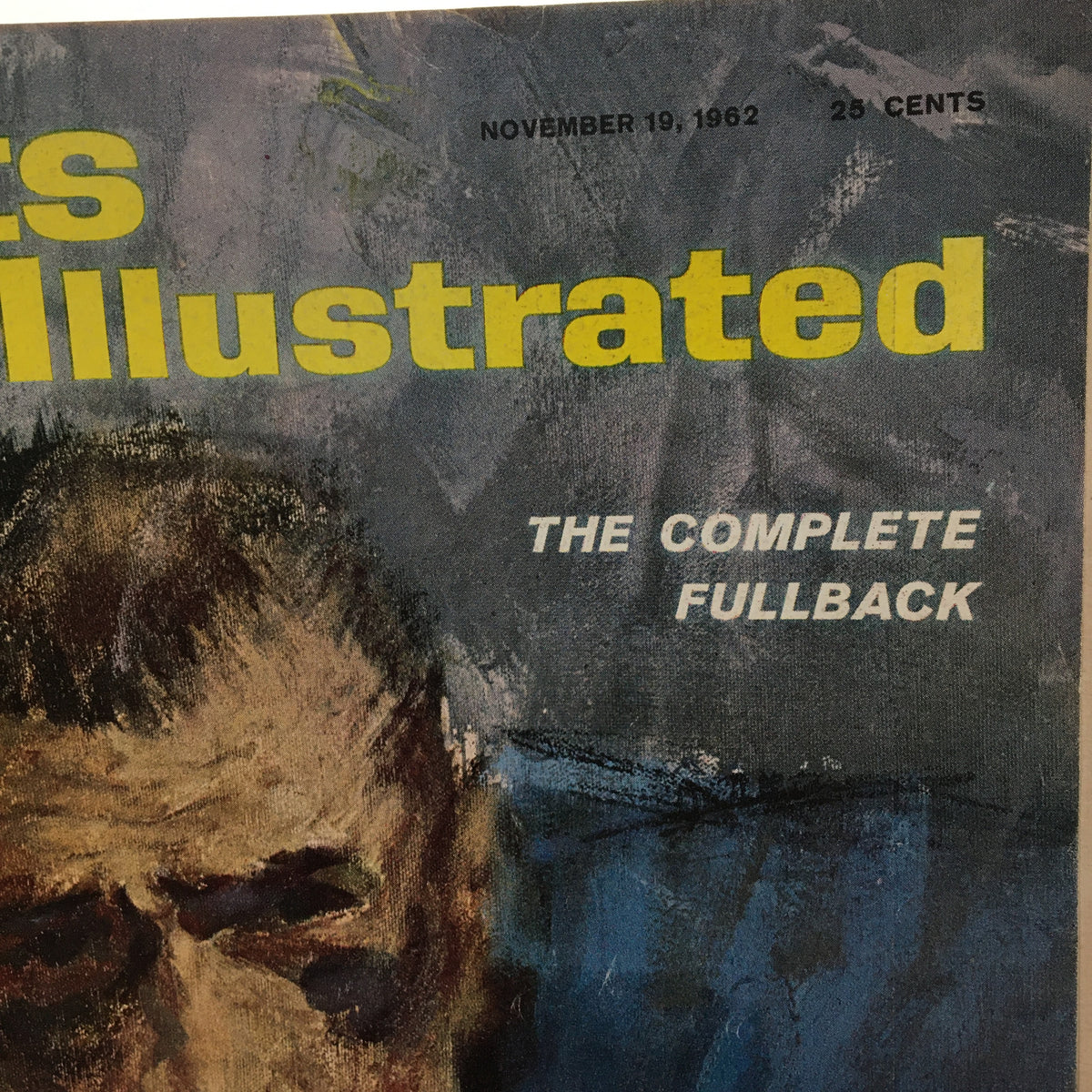 Detailed shot of the Sports Illustrated magazine cover from November 19, 1962, with bold yellow text and an artistic image of Nick Pietrosante of the Lions.