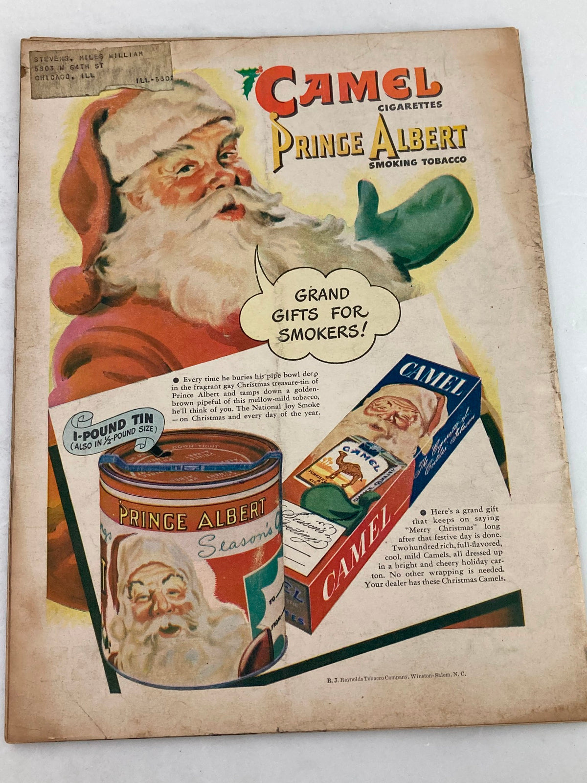 Back cover of VTG Foreign Service Magazine December 1946 Vol 34 #4 featuring a vintage advertisement for Camel Prince Albert Smoking Tobacco, showcased with a jolly Santa Claus illustration.