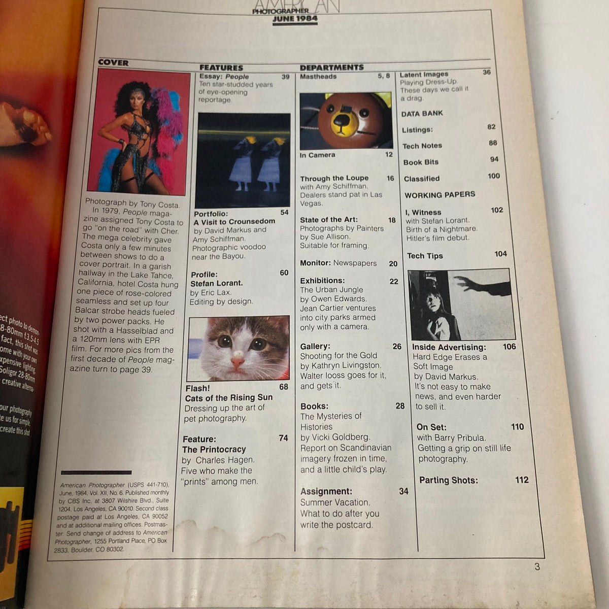 Inside page of American Photographer Magazine June 1984, displaying a contents page with features including Cher's photograph and articles related to photography.