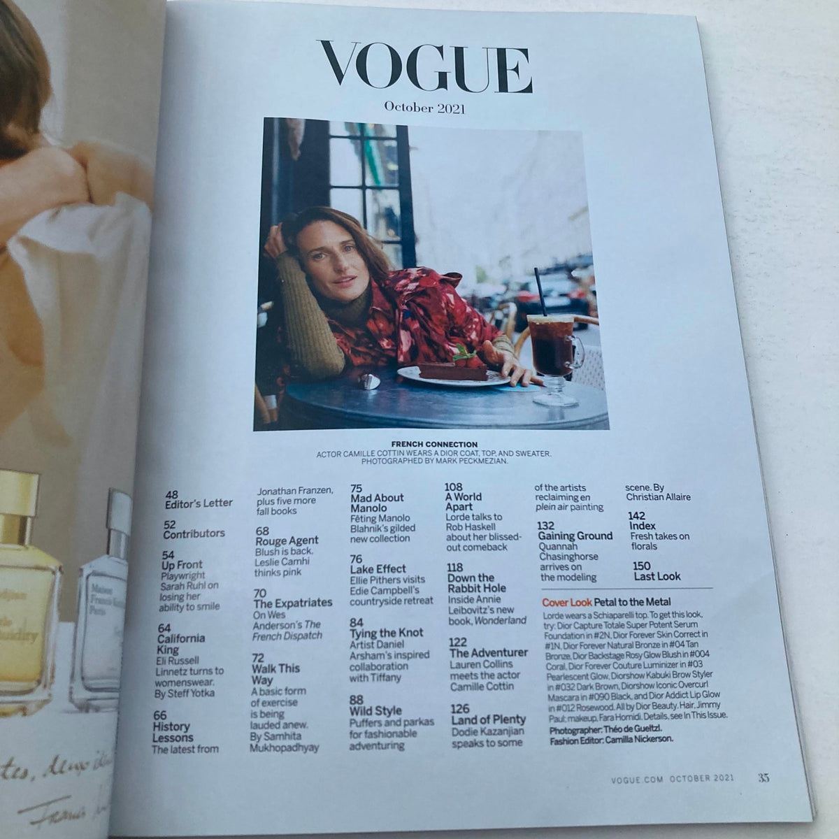 Interior page of Vogue Magazine October 2021 featuring the Editor's Letter and contents including French Connection, showcasing the fashion narrative and contributors in the issue titled 'The Year of the Lorde, Jay-Z & Beyoncé'.