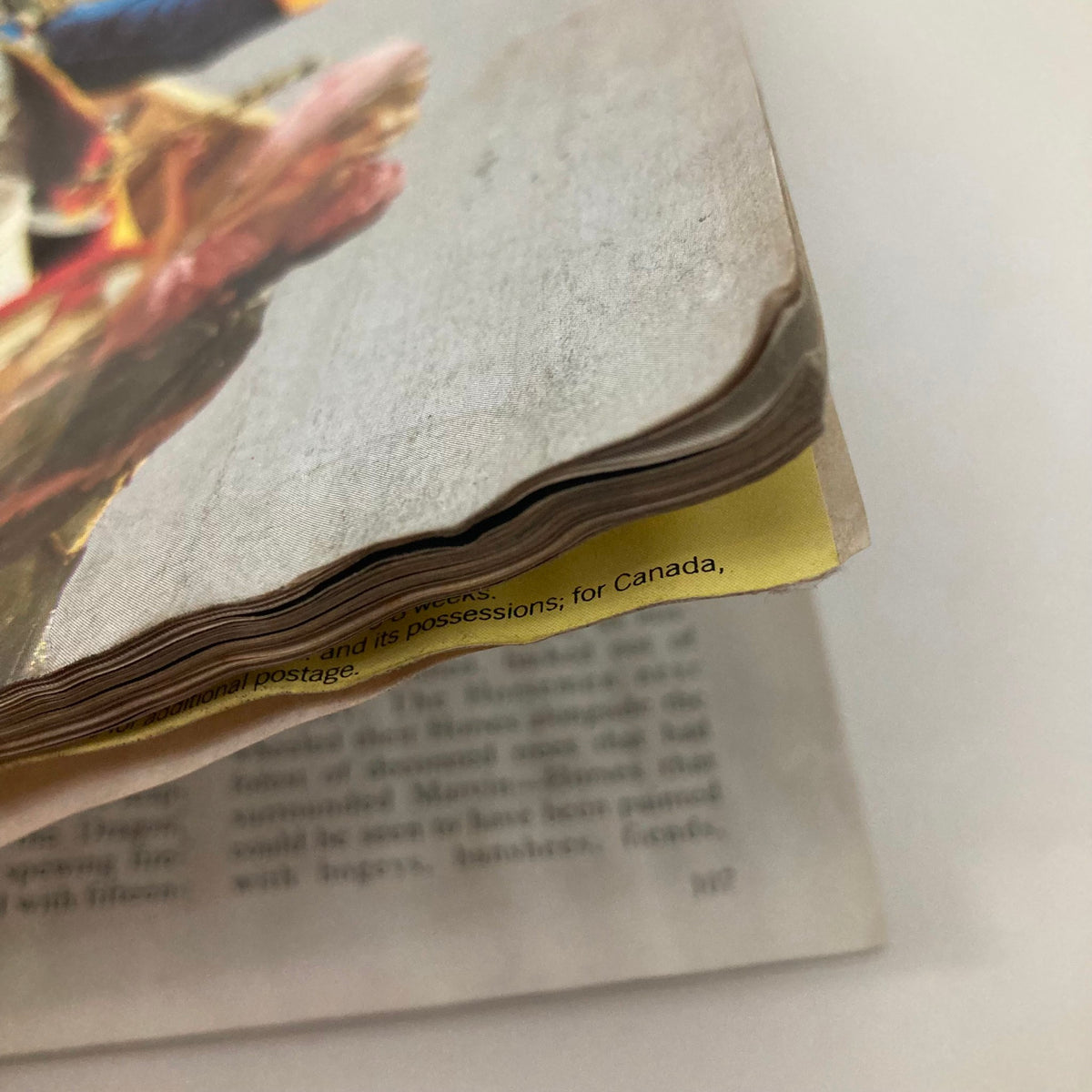 Side view of the well-worn pages of the July 1983 Vanity Fair Magazine, highlighting its vintage condition with frayed edges. Title: VTG Vanity Fair Magazine July 1983 George Washington by Red Grooms No Label.