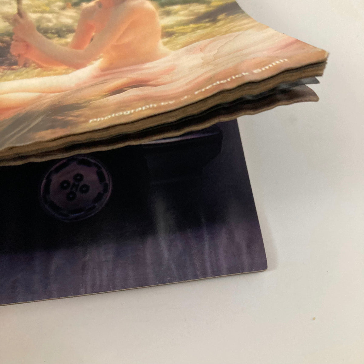 Side view of the May 1984 American Photographer Magazine displaying the worn edges and texture of the vintage pages, highlighting its historical significance.