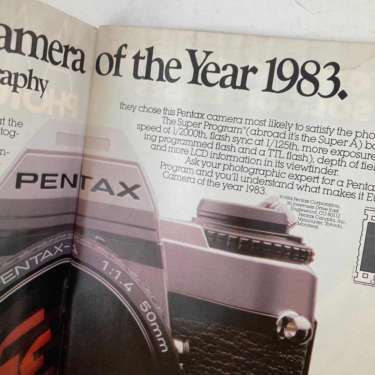 Inside page of American Photographer Magazine March 1984 showcasing a Pentax Camera as the Camera of the Year 1983.