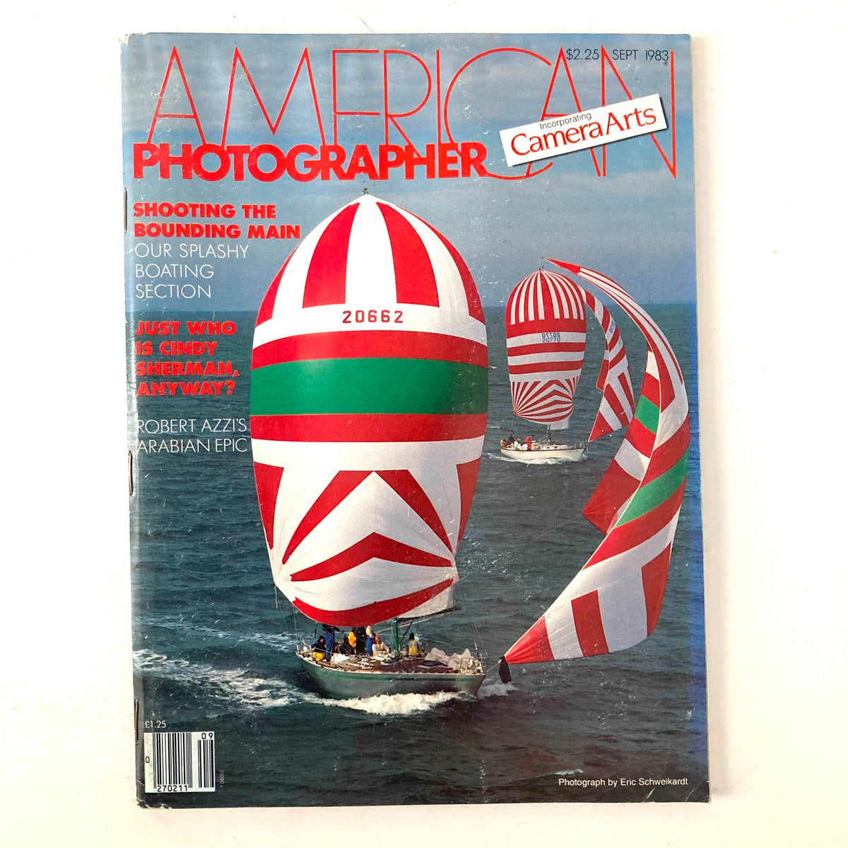 Cover of American Photographer Magazine, September 1983, featuring vibrant yacht racing sails in red and green colors, highlighting maritime photography.
