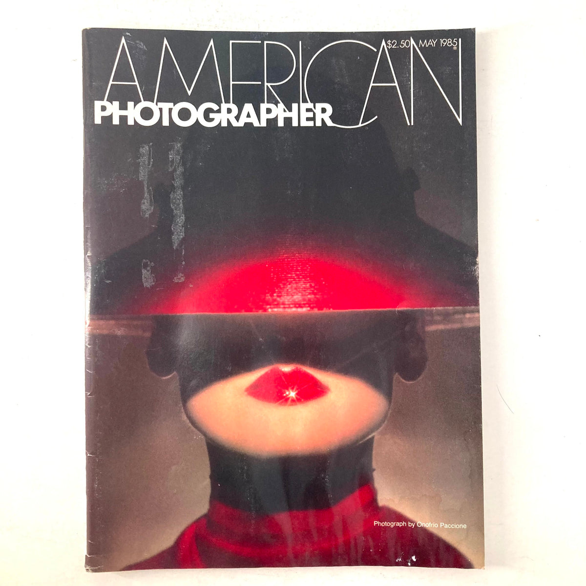 Cover of American Photographer Magazine May 1985 featuring a photograph by Onofrio Paccione, showcasing a unique artistic perspective.