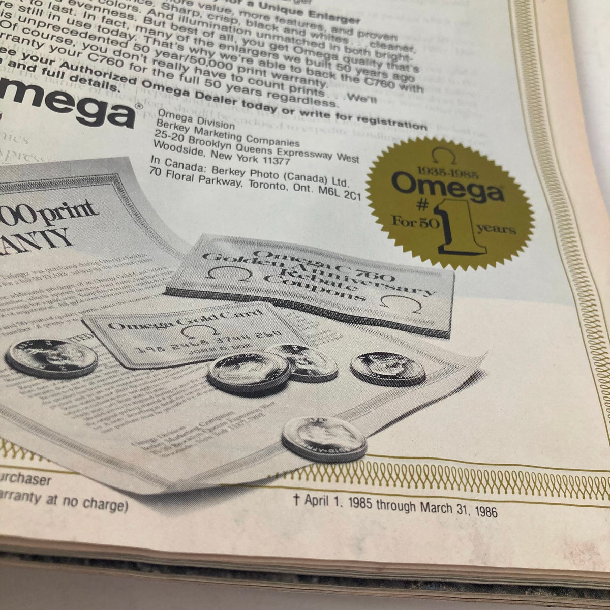 Image from American Photographer Magazine May 1985 displaying an advertisement for Omega with promotional material and gold cards.