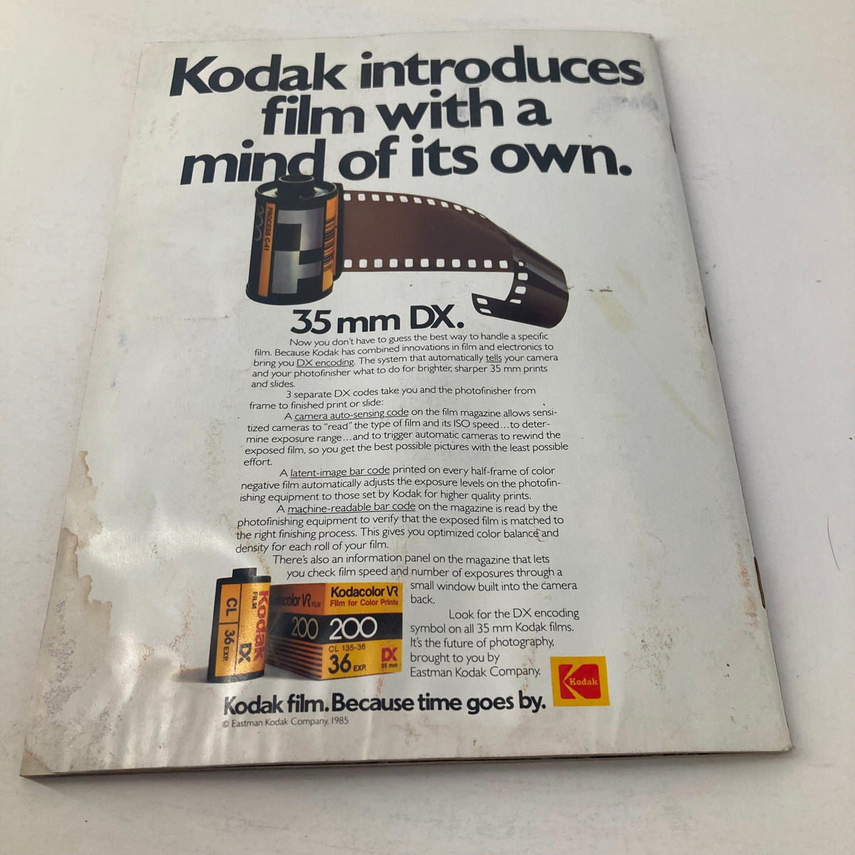 Back cover of American Photographer Magazine May 1985, featuring a Kodak advertisement introducing 35 mm DX film technology.