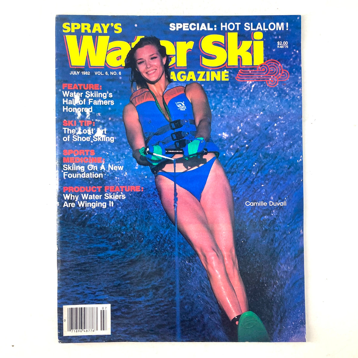 Cover of Spray's Water Ski Magazine July 1982 Vol 6 No. 6 featuring Camille Duvall, showcasing water skiing action with vibrant colors and bold text highlighting special features.