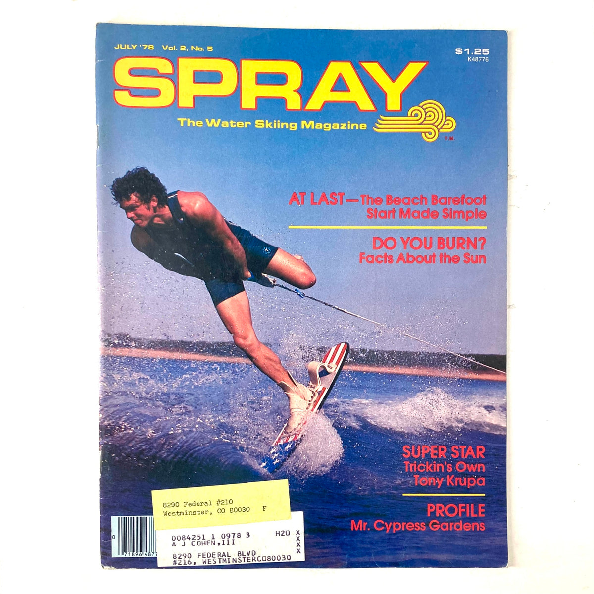 Cover of Spray The Waterskiing Magazine from July 1978 featuring Tony Krupa showcasing waterskiing tricks, highlighting the magazine's vibrant history in watersports.