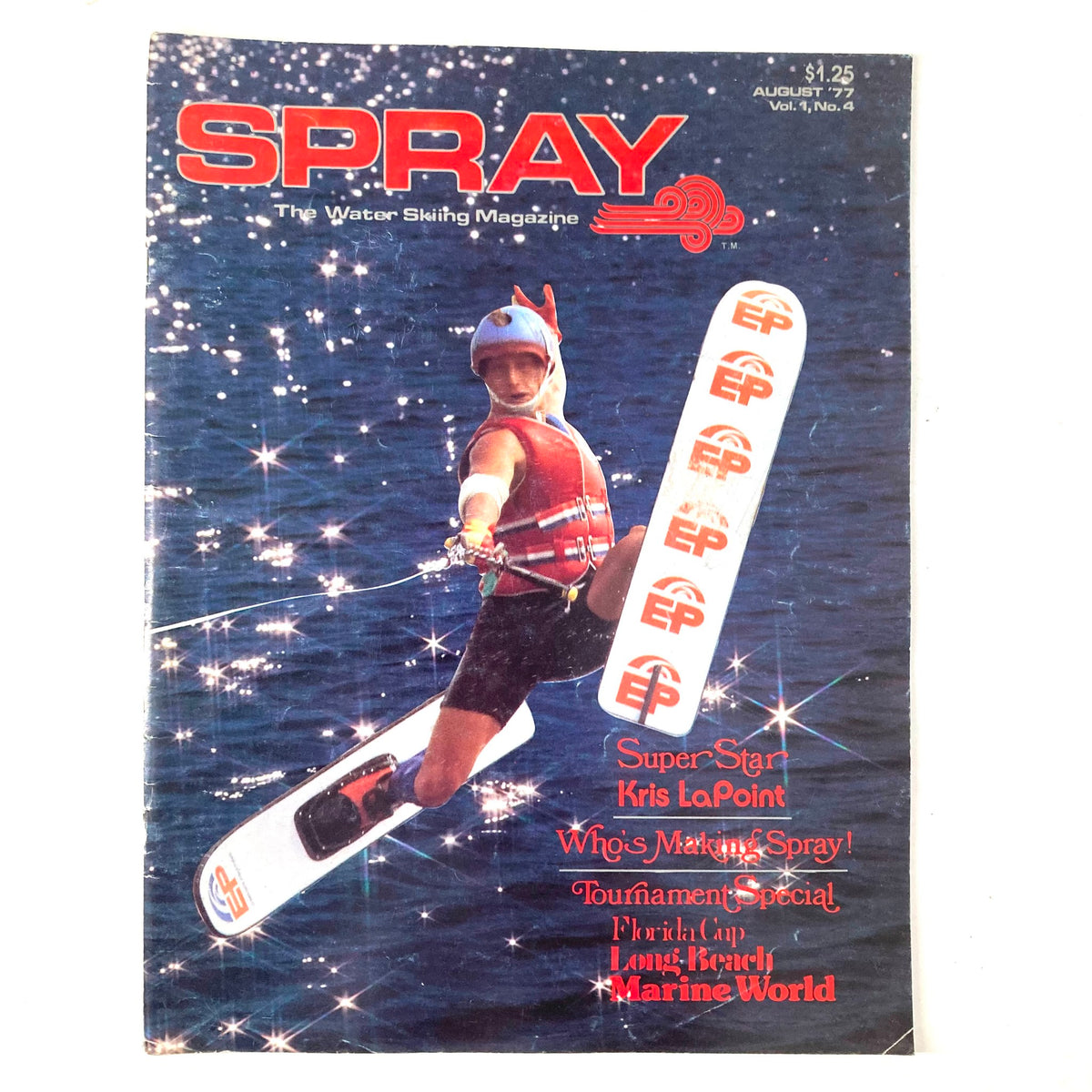 Spray The Water Skiing Magazine August 1977 featuring Super Star Kris LaPoint on the cover, showcasing a vibrant water skiing scene.