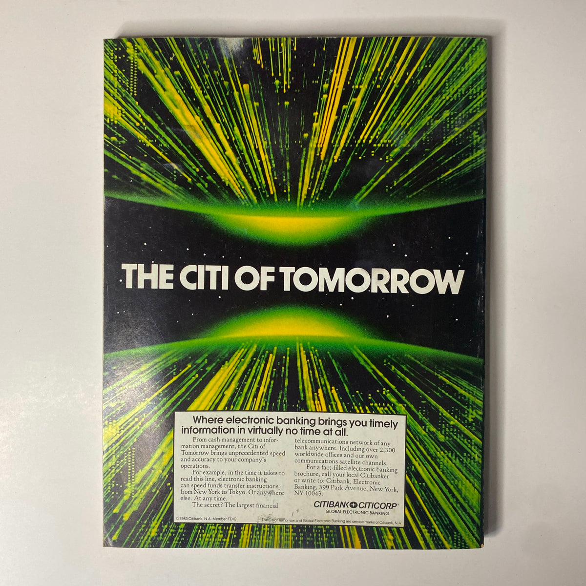 Back cover of Forbes Magazine from May 9, 1983, advertising electronic banking services with a graphic design of green streaks and the phrase 'The Citi of Tomorrow'.