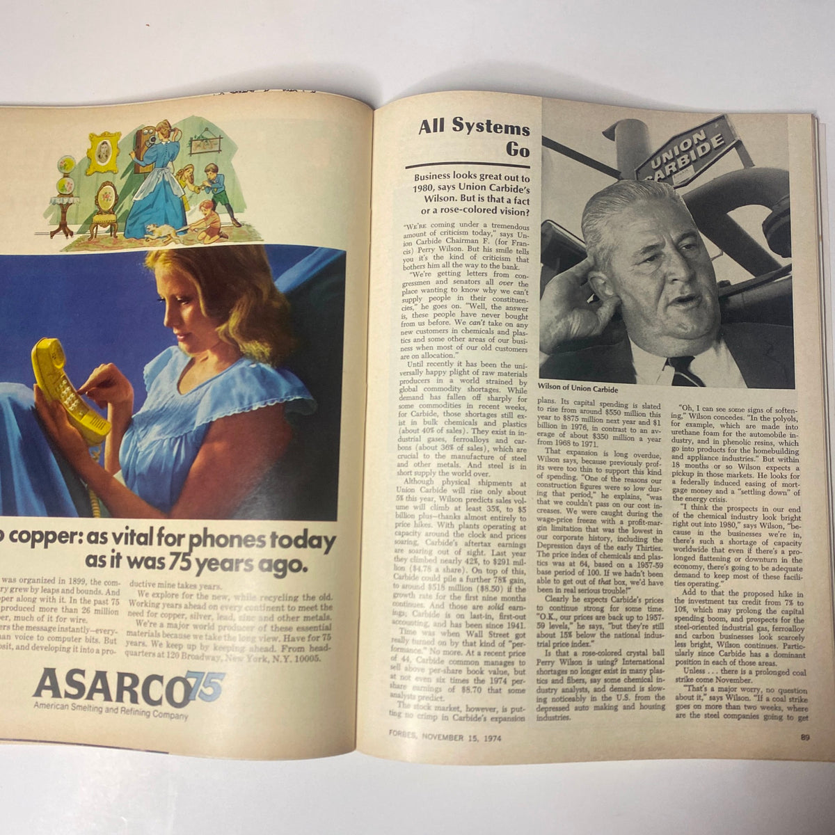 Interior page from Forbes Magazine, November 15, 1974, displaying a blend of advertising and an article about Union Carbide, highlighting mid-1970s corporate perspectives and economic discussions.