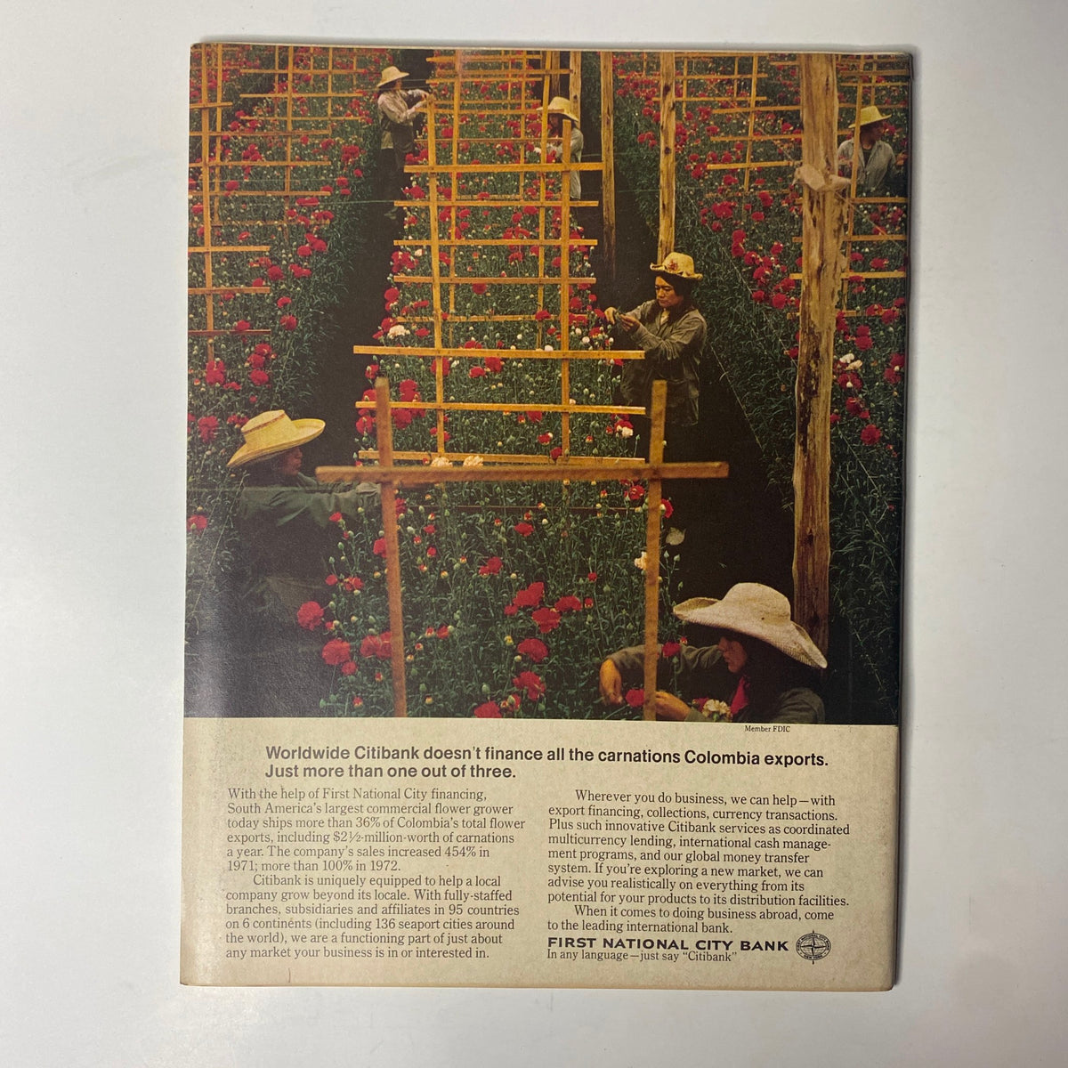 Back cover of Forbes Magazine April 1, 1974, showcasing a colorful image of Colombian flower growers and a Citibank advertisement promoting international business financing.