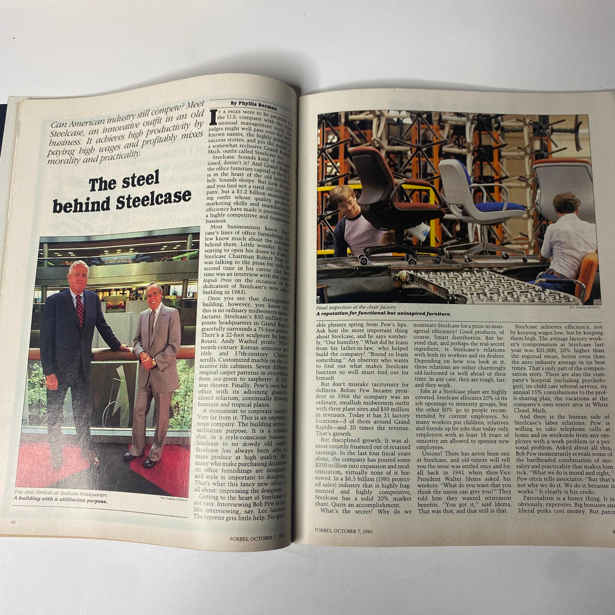 A two-page spread from Forbes Magazine October 7, 1985, presenting an article on Steelcase, focusing on the company's productivity and industry position.