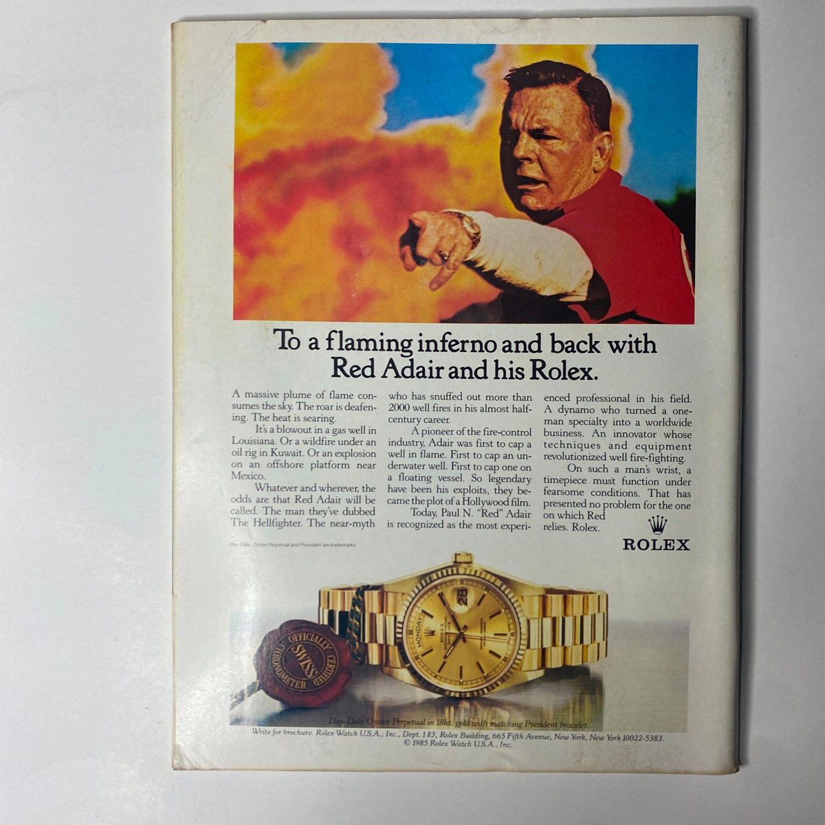 Back cover of Forbes Magazine August 24, 1987, featuring an advertisement for Rolex watches with Red Adair highlighting his fire control expertise.