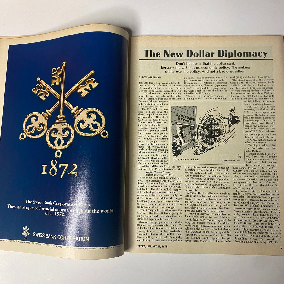 Forbes Magazine January 23, 1978 featuring a page discussing 'The New Dollar Diplomacy' including imagery related to economic analysis and the Swiss Bank Corporation advertisement.