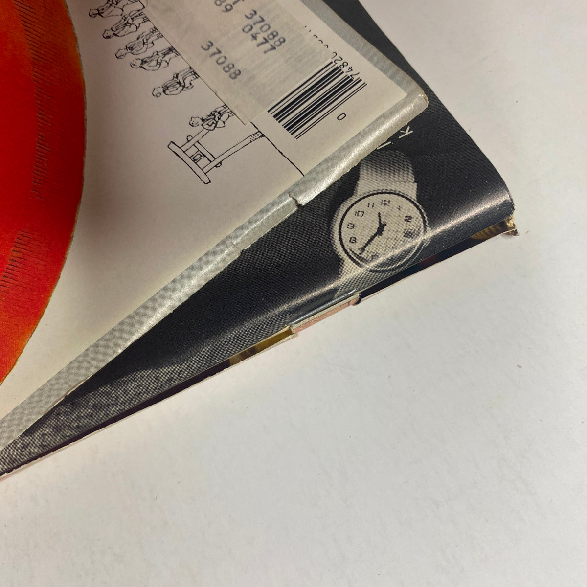 Close-up of the spine and edge of Forbes Magazine May 18, 1987, revealing its vintage condition and details.