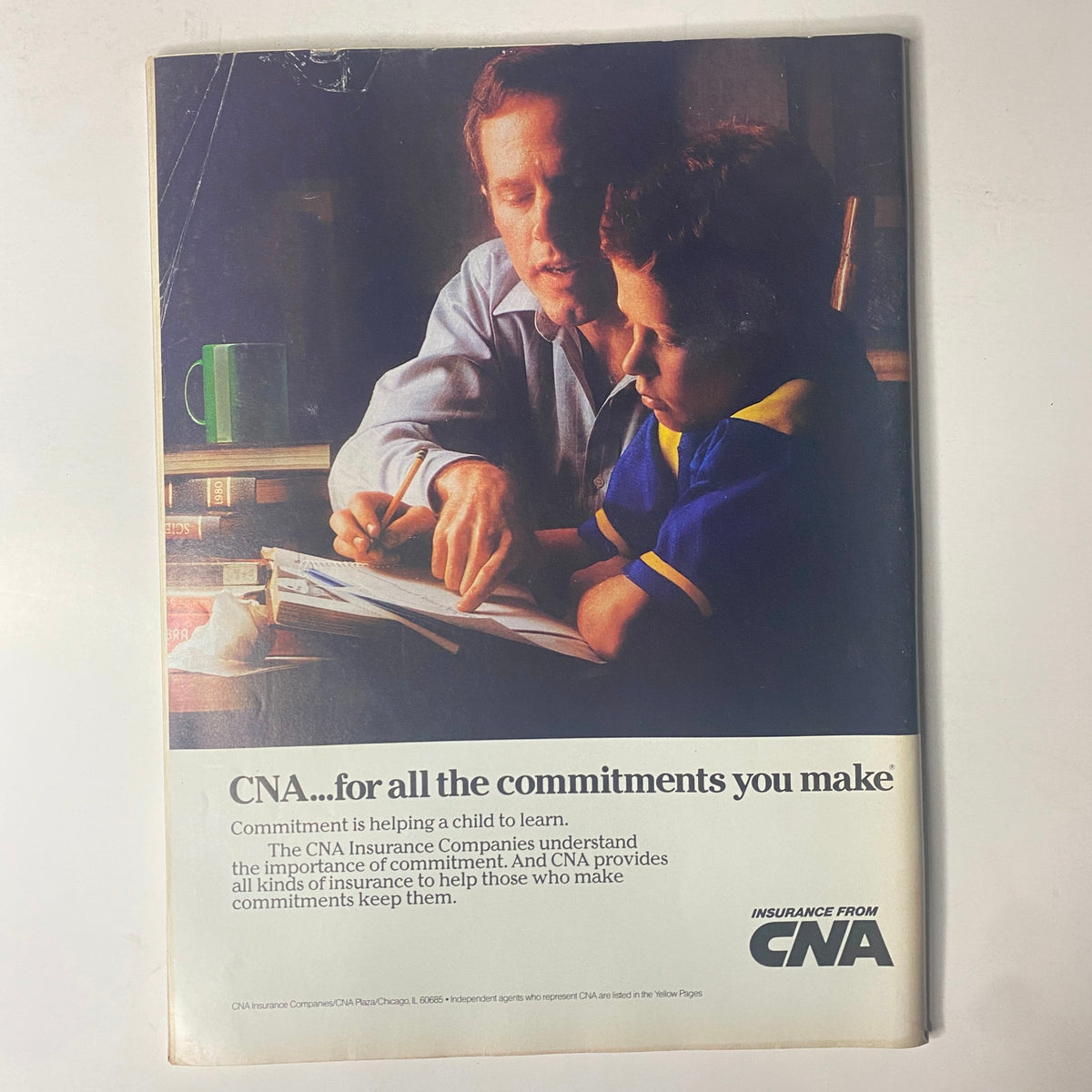 Cover of a CNA Insurance advertisement showing a father teaching his son, emphasizing commitment in relationships and decision-making, featured in Forbes magazine, February 9, 1987.