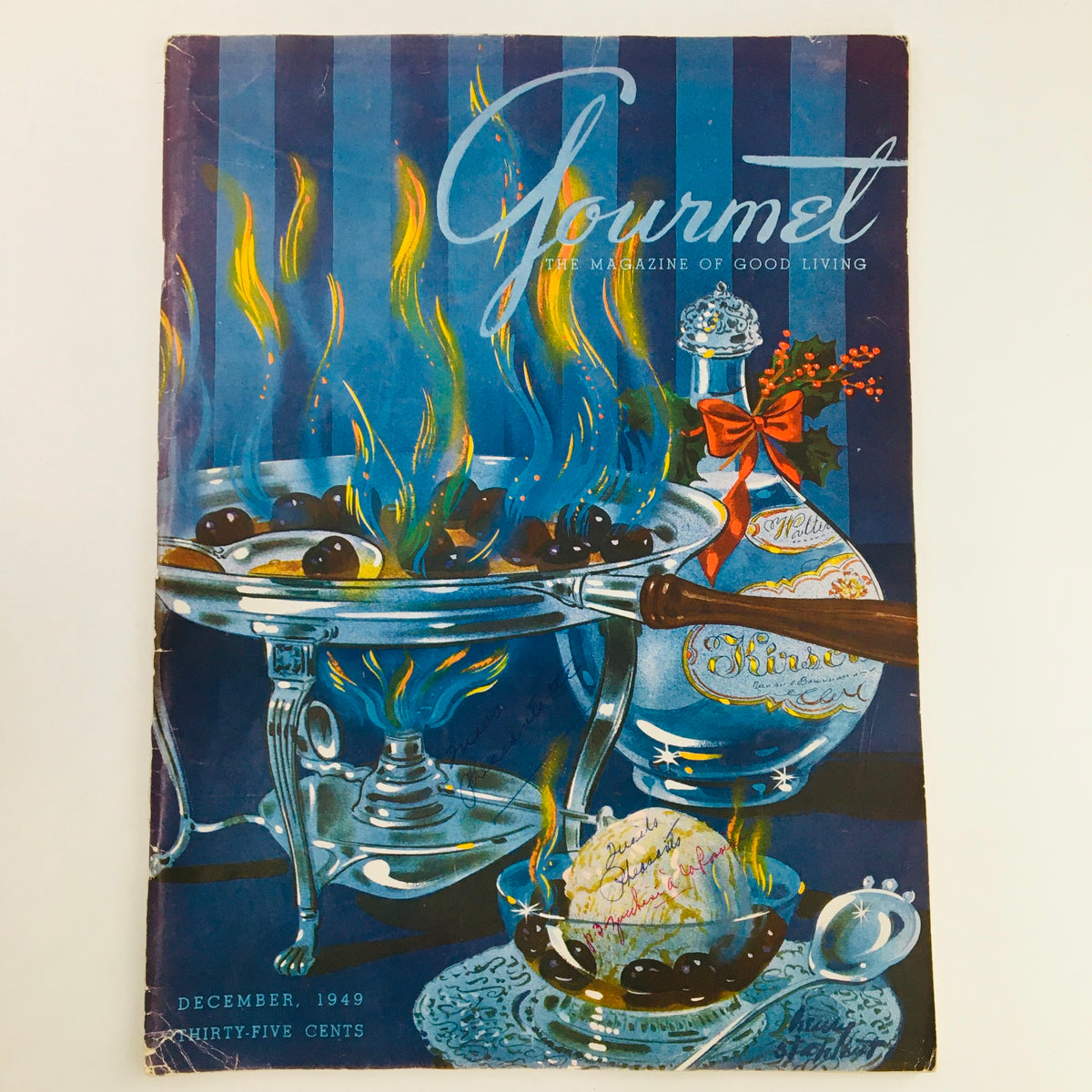 Cover image of Gourmet Magazine December 1949, featuring vibrant artwork with flames and culinary illustrations, a representation of food culture from the era.