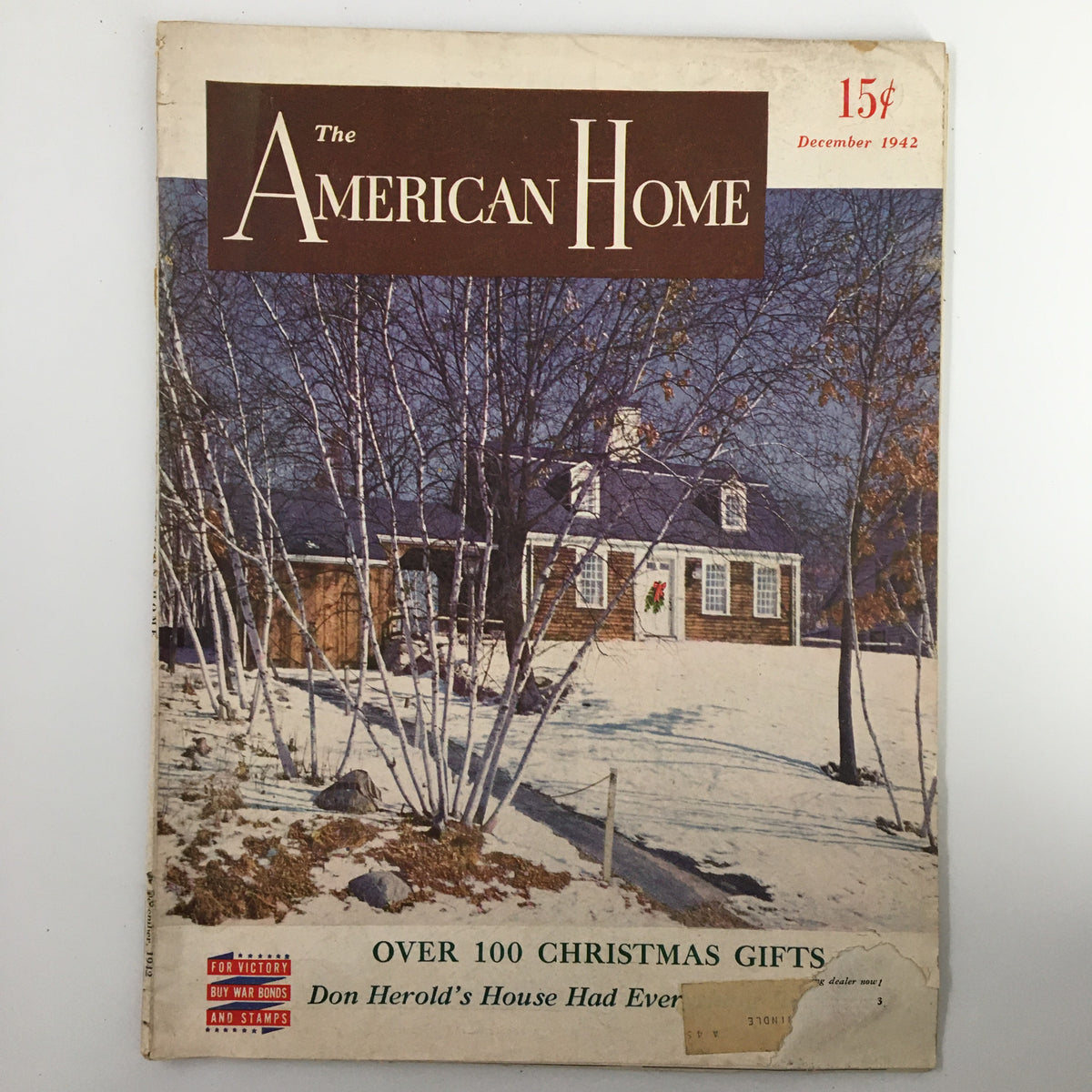 Front cover of VTG The American Home Magazine December 1942 featuring snowy landscape and a house, titled 'Tomorrow Will Be Christmas Sonny.' Offers insight into Christmas celebrations during World War II.