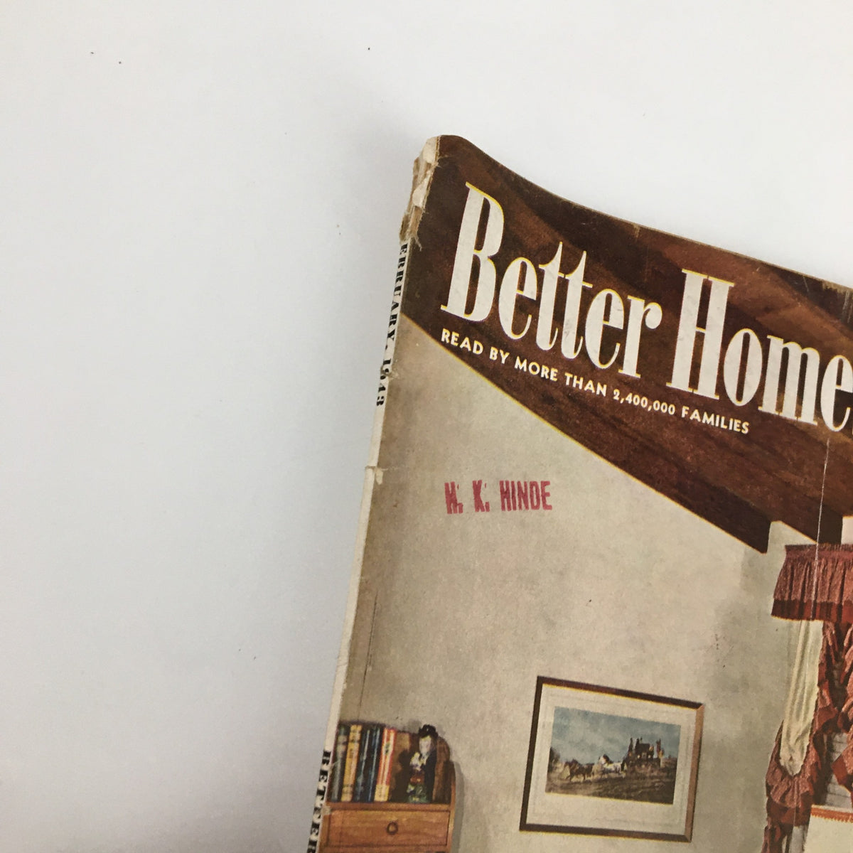 Close-up of the cover of the VTG Better Homes & Gardens Magazine February 1943, featuring the title and author H.K. Hinde, highlighting vintage magazine design.