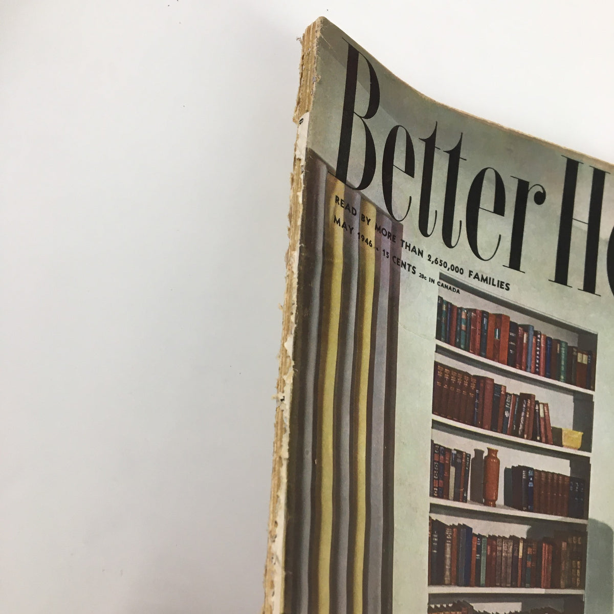 Side view of the VTG Better Homes & Gardens Magazine May 1946, highlighting its vintage worn edges and historical charm.