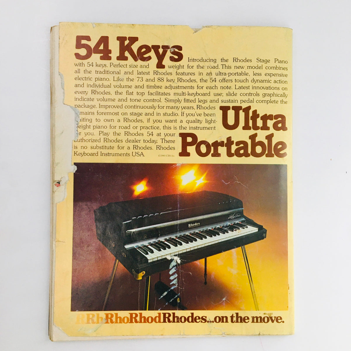 Guitar Player Magazine April 1980 advertisement showcasing the Rhodes Stage Piano, highlighting its 54 keys and portable features.