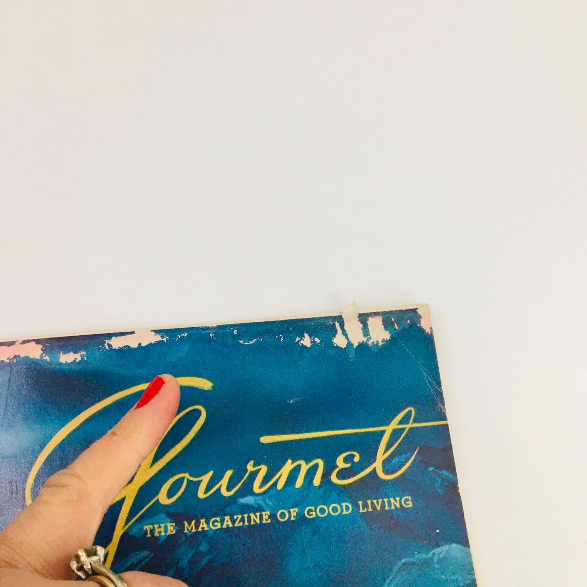 Top corner of Gourmet Magazine February 1955 Vol 15 #2, showcasing the magazine title and logo.