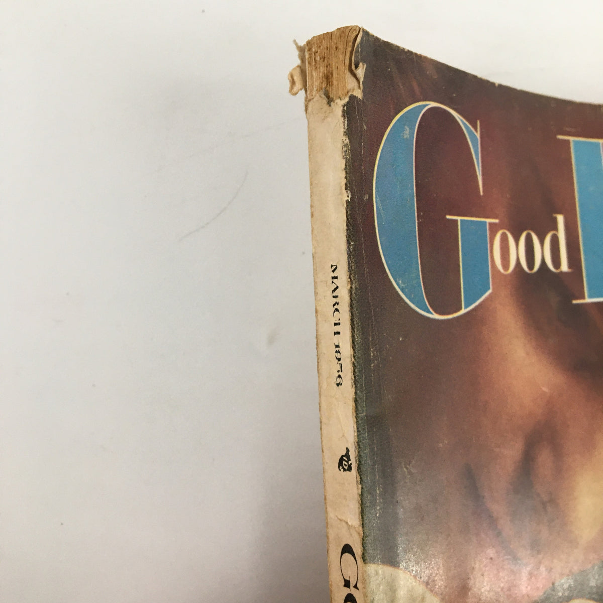 Vintage Good Housekeeping March 1956 magazine with noticeable wear on the spine, showcasing its nostalgic appeal.