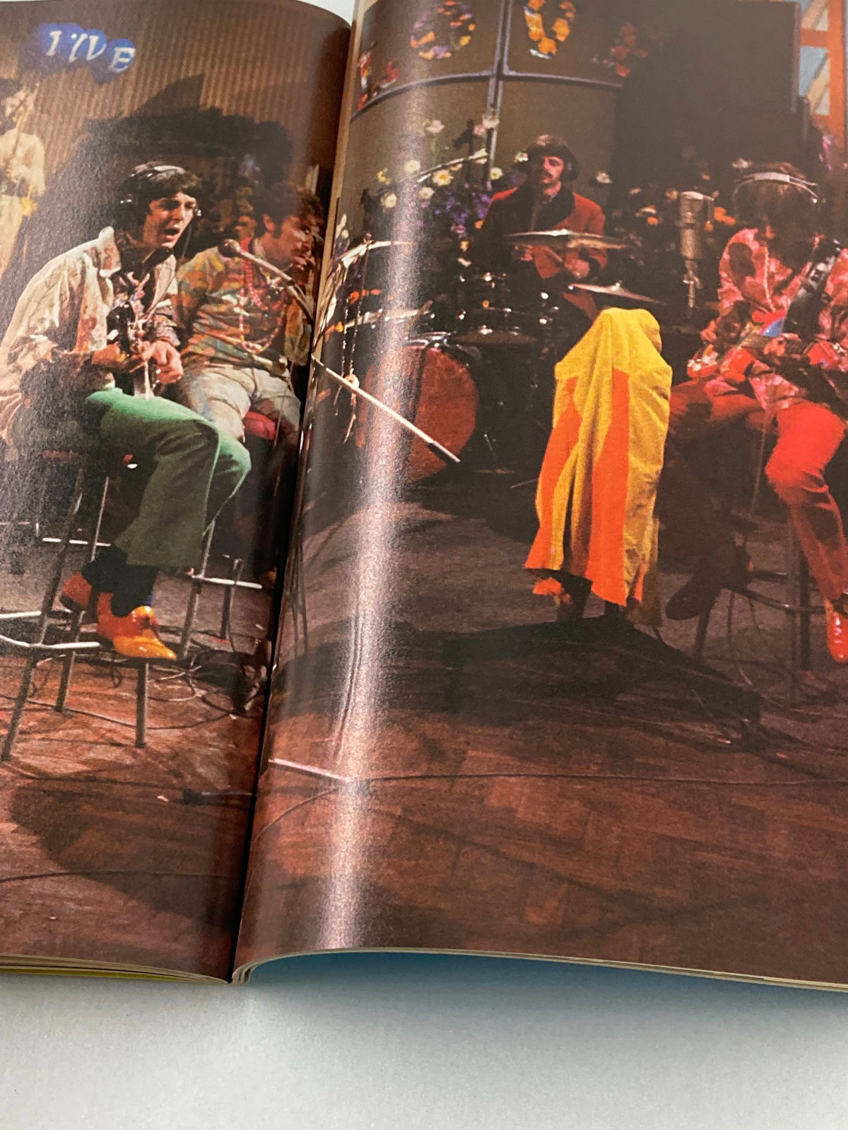 Image depicting the Beatles performing, from the 1981 The Beatles' John Lennon 1940-1980 A Memorial Album, showcasing their iconic style.