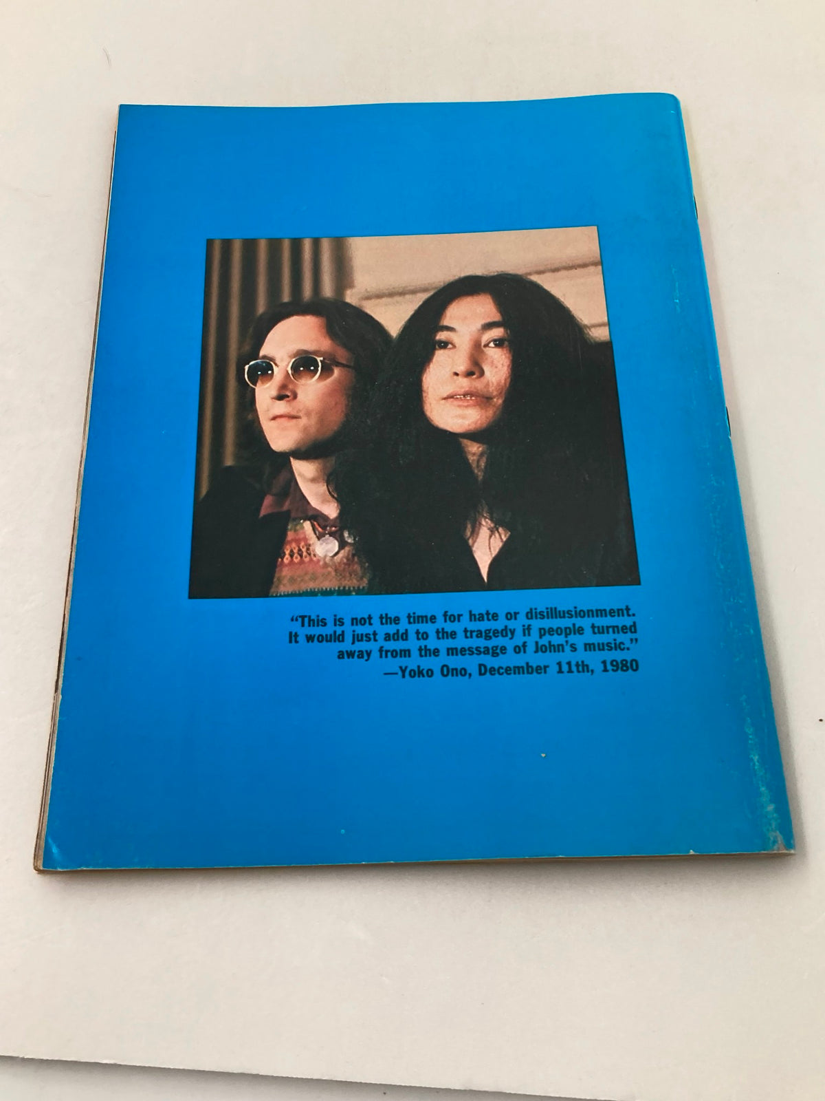 Cover of the 1981 The Beatles' John Lennon 1940-1980 A Memorial Album featuring John Lennon and Yoko Ono with a quote from Yoko Ono, encapsulating the essence of Lennon's legacy.