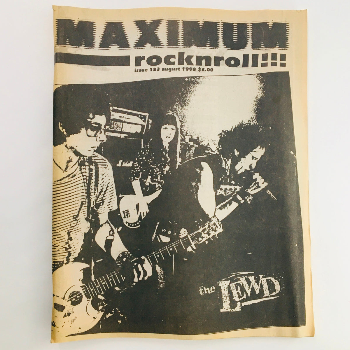 Cover of Maximum RocknRoll Magazine August 1998 #183 featuring The Lewd band, showcasing iconic punk rock imagery and typography.