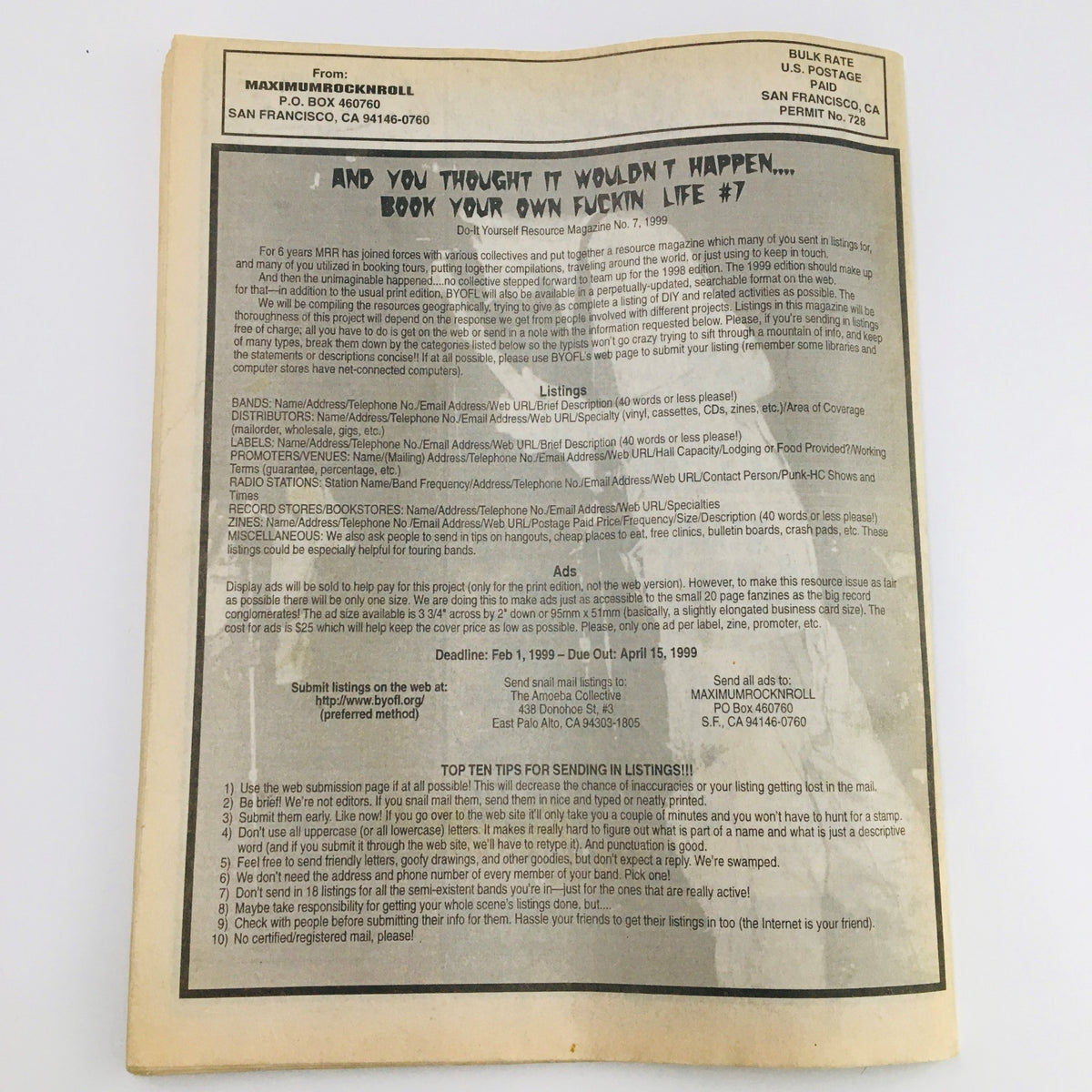 Back cover of Maximum RocknRoll Magazine January 1999 #188, displaying a call to action for punks to book their own events and support the DIY ethic of the punk rock scene.