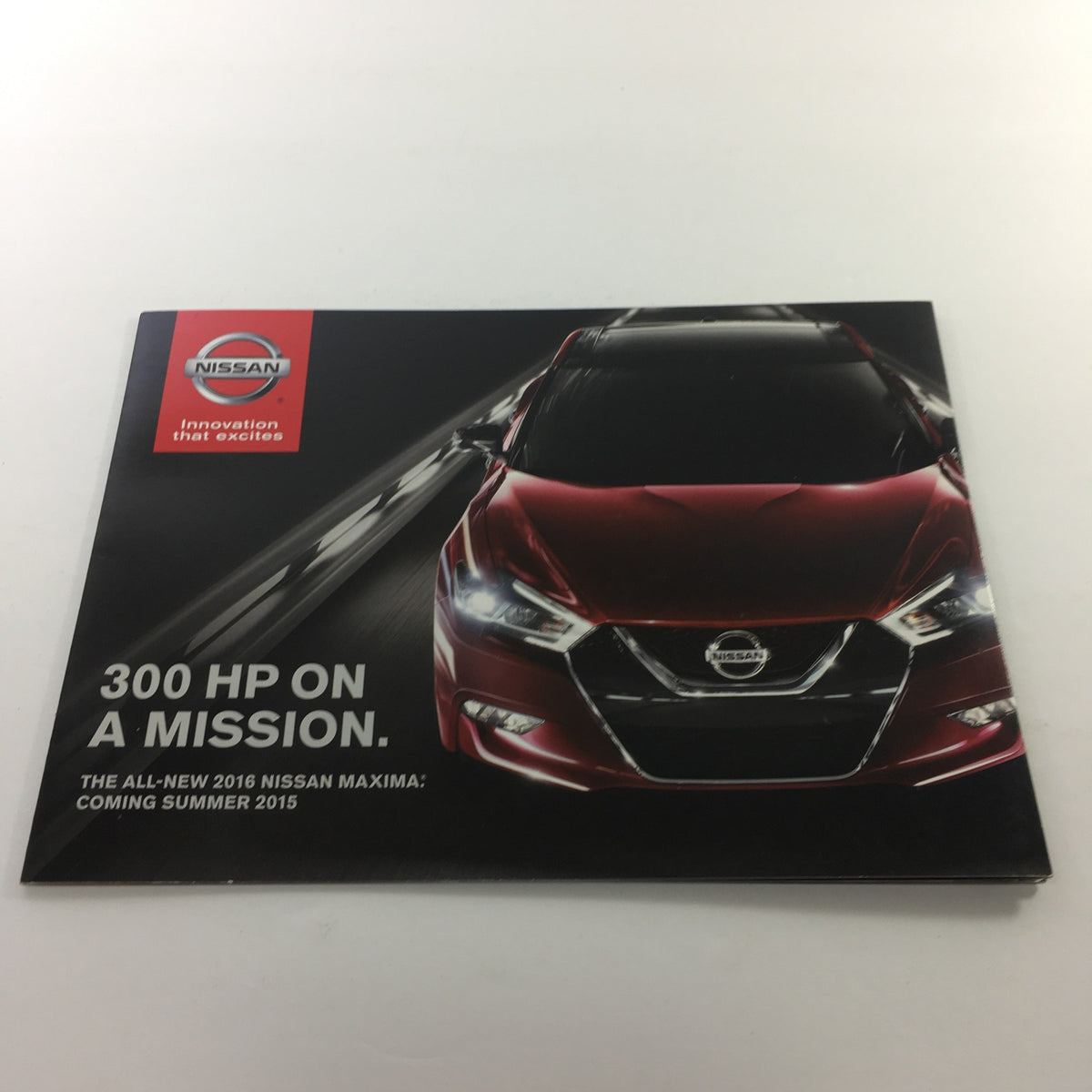 Cover of the 2016 Nissan Maxima 300-HP On A Mission dealership car auto brochure catalog featuring a sleek red Nissan Maxima car design.